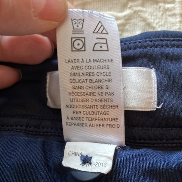 Great Greg Norman navy skort with navy and silver braid around waistband. - Picture 9 of 15